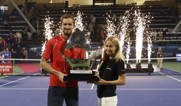 Daniil Medvedev accompanied by his wife after winning in the ATP Dubai Duty Free Tennis Championship final in Dubai.