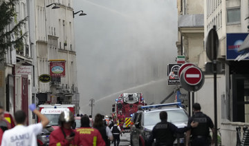 Four badly injured, two missing in Paris building blast